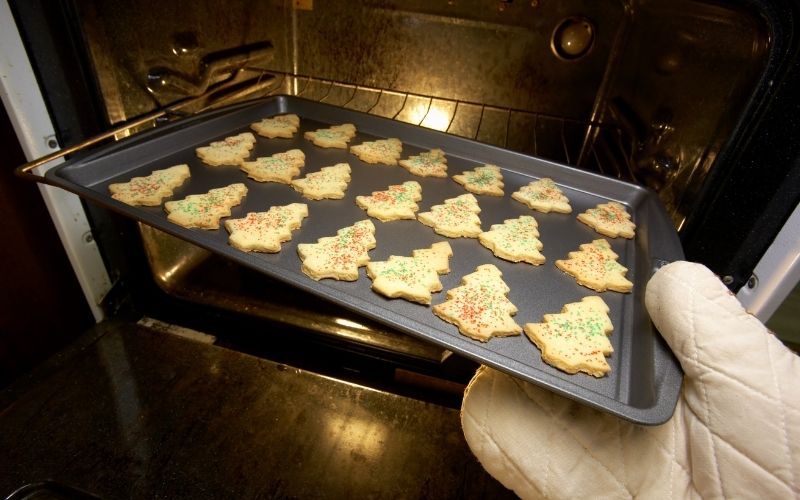 Christmas cookies going in the oven