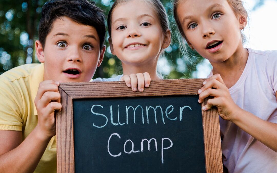 Kids holding summer camp sign